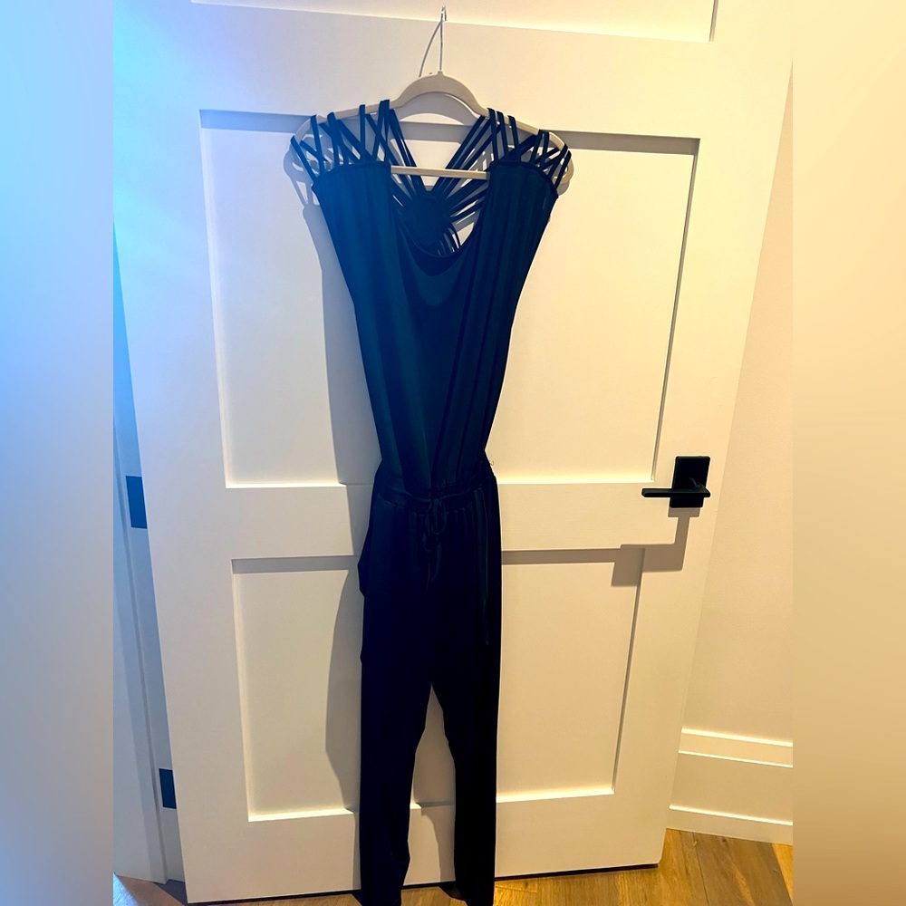 Black jumpsuit with amazing back strap design